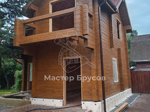 Покраска дома из бруса 190х190 мм